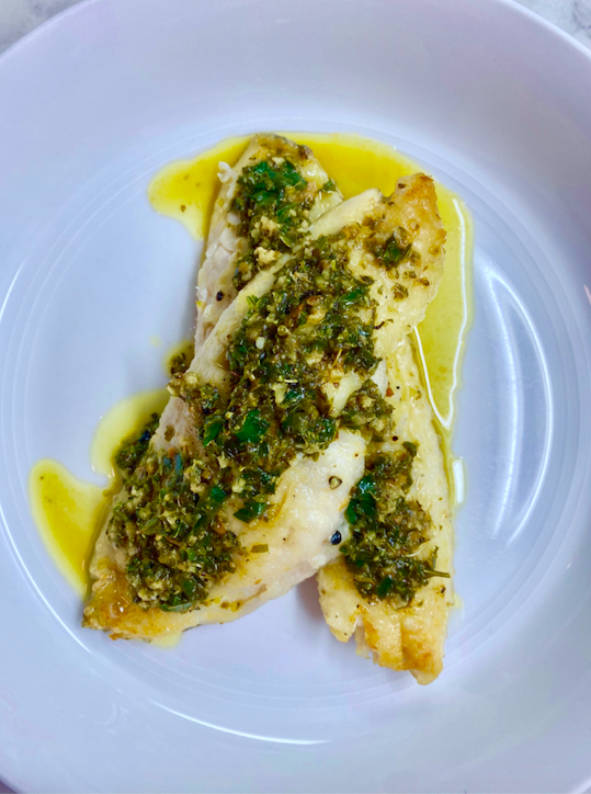 Pan Fried Black Sea Bass Served With A Lemon Garlic Herb